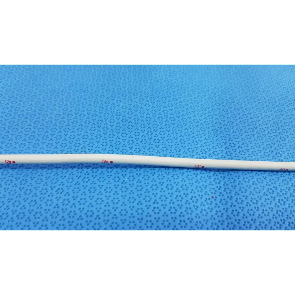 White cylindrical American Endoscopy 15FR maloney tapered tungsten-filled esophageal bougie with red markings