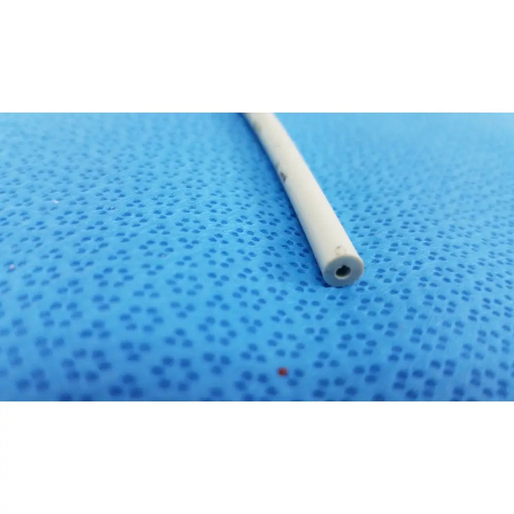 White cylindrical endoscopy 15fr maloney bougie with hollow center and slightly worn surface for esophageal use