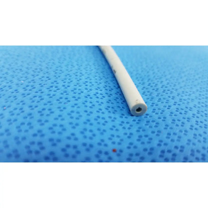 White cylindrical endoscopy 15fr maloney bougie with hollow center and slightly worn surface for esophageal use