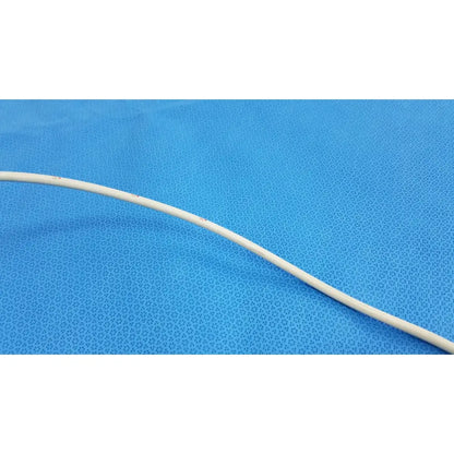 A white flexible american endoscopy 18fr maloney tapered tungsten-filled esophageal bougie cable curved across frame