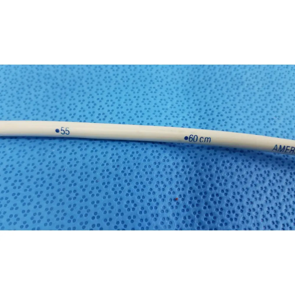 Beige smooth-textured american endoscopy 18fr maloney tapered tungsten-filled esophageal bougie with blue markings