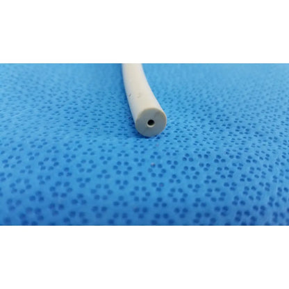 White cylindrical american endoscopy 24fr maloney tapered tungsten-filled esophageal bougie with small hole on blue surface
