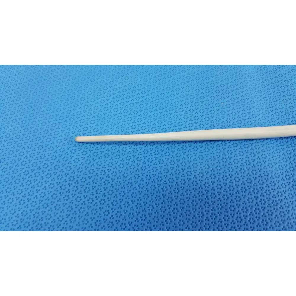 A slender off-white plastic hair pick with a smooth tapered design in the american endoscopy 24fr maloney esophageal bougie