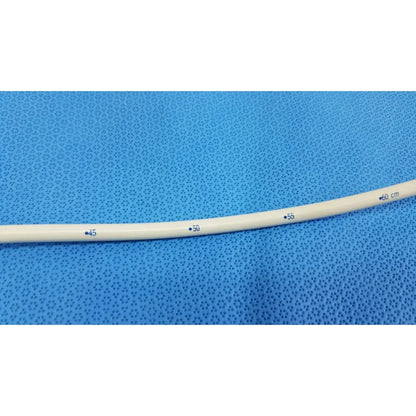 Beige flexible tungsten-filled american endoscopy 24fr maloney esophageal bougie with blue centimeter markings