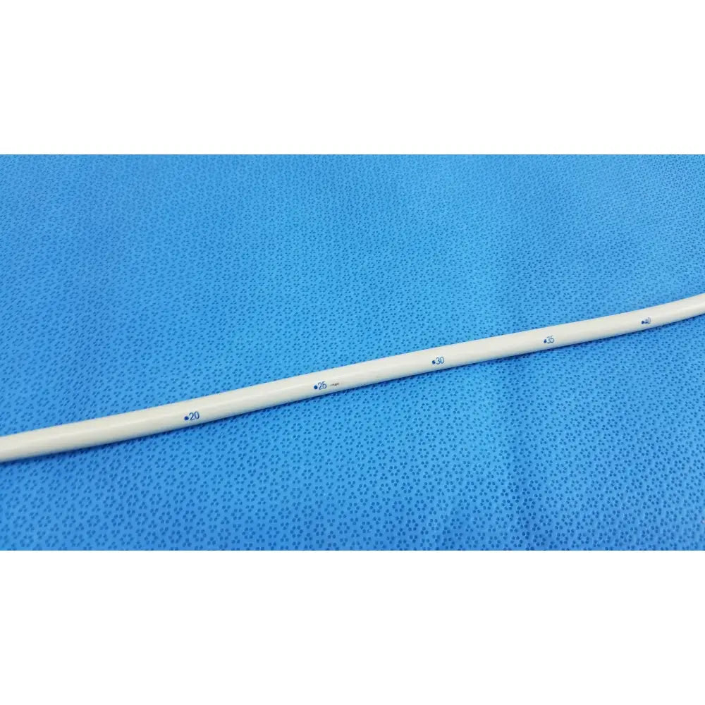 A white smooth-textured american endoscopy 27fr maloney tapered tungsten-filled esophageal bougie with blue markings