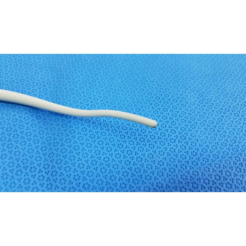 A smooth off-white american endoscopy 27fr maloney tapered tungsten-filled esophageal bougie on blue background