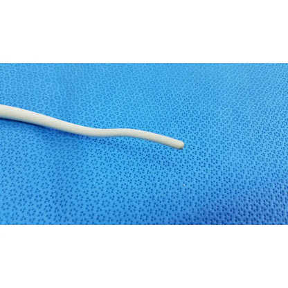 A smooth off-white american endoscopy 27fr maloney tapered tungsten-filled esophageal bougie on blue background
