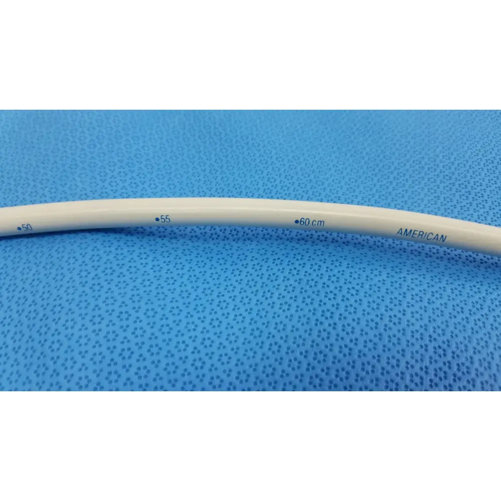 White medical-grade tungsten-filled catheter with measurements and american branding for endoscopy 30fr maloney use
