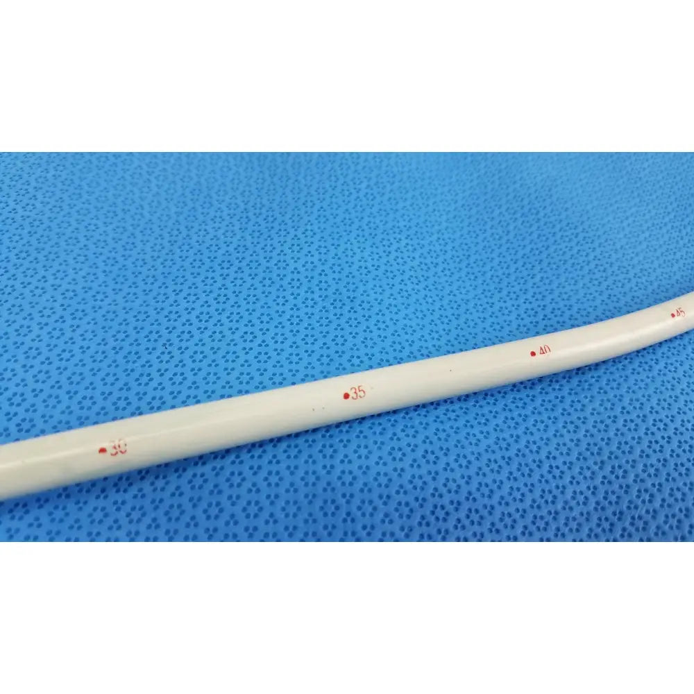 White plastic endoscopy 30fr maloney tapered tungsten-filled esophageal bougie with red numerical markings