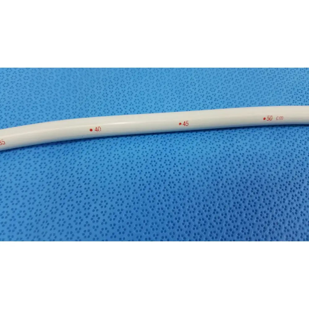 White plastic measuring tube with red centimeter markings for american endoscopy 33fr maloney tapered esophageal bougie
