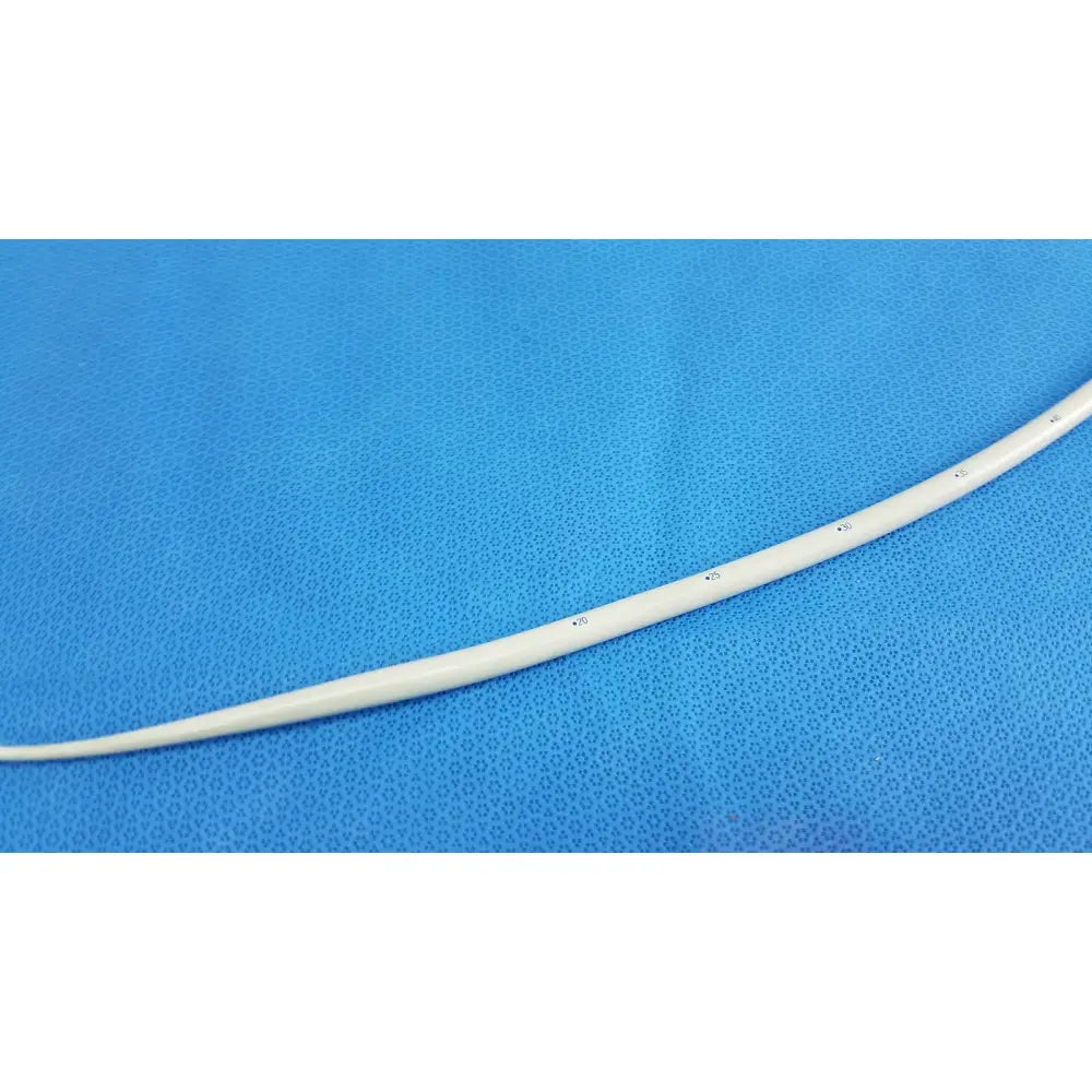 A white flexible american endoscopy 33fr maloney tapered tungsten-filled esophageal bougie with black markings
