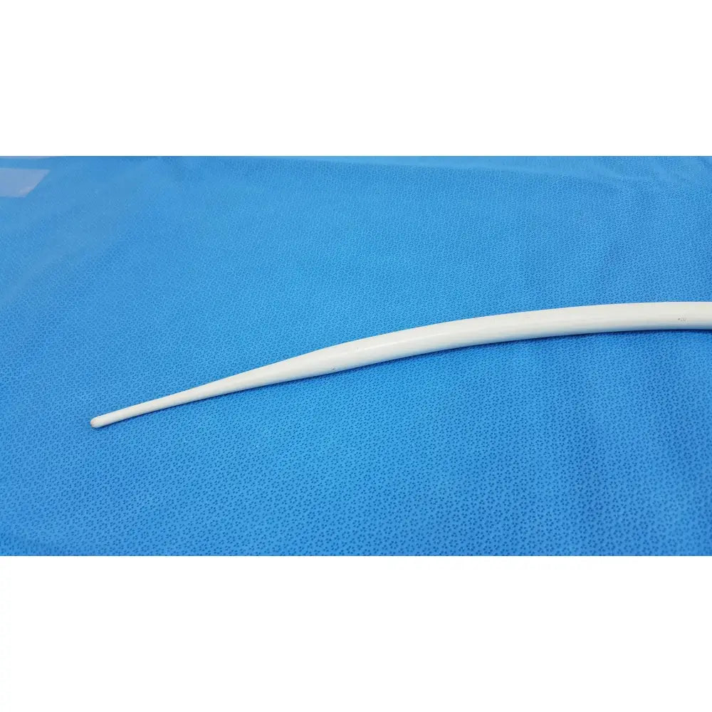 A smooth white elongated american endoscopy 51fr maloney tungsten-filled esophageal bougie with tapered tip on blue surface