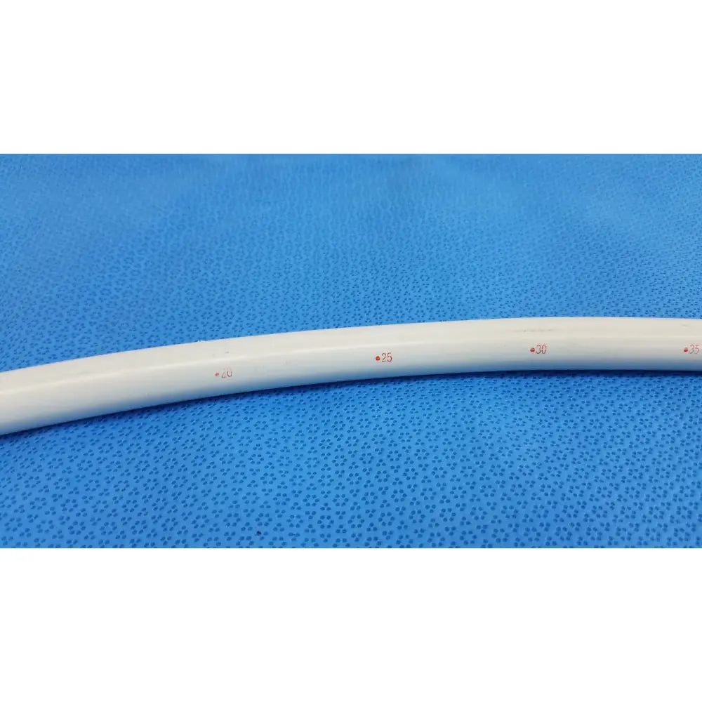 White plastic tube with red measurement markings of american endoscopy 51fr maloney tapered tungsten-filled bougie