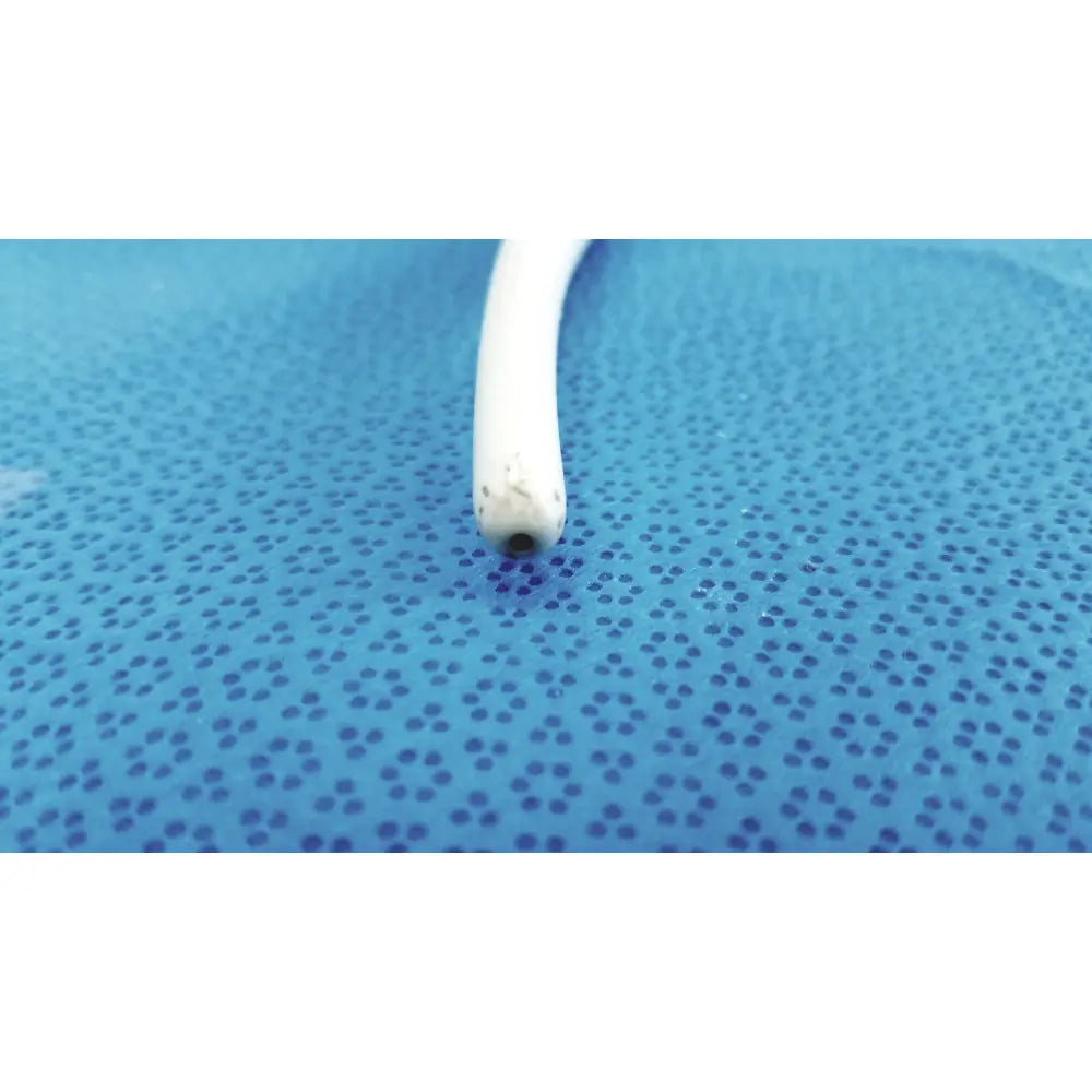 White plastic catheter with rounded tip for american endoscopy 54fr maloney tungsten-filled esophageal bougie on blue surface