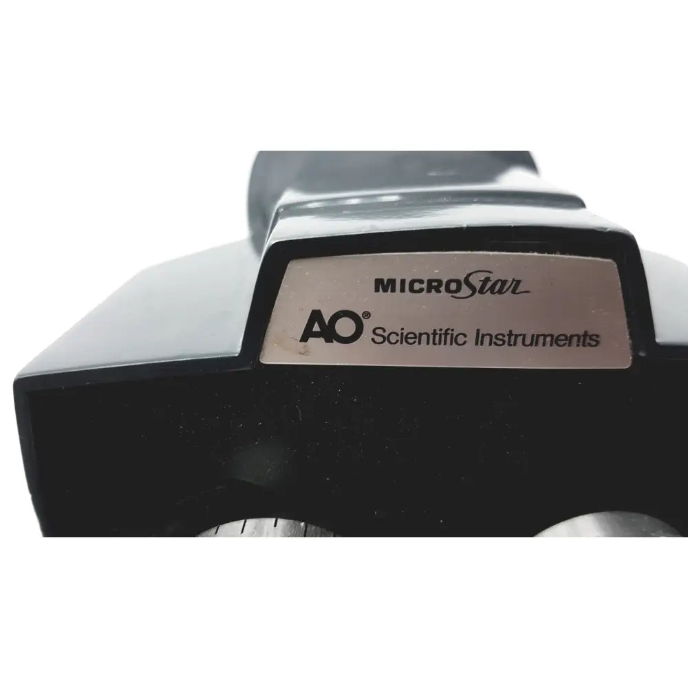 Black american optical microstar 110 120 binocular head microscope with ao scientific instruments metallic plate