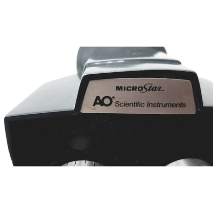 Black american optical microstar 110 120 binocular head microscope with ao scientific instruments metallic plate