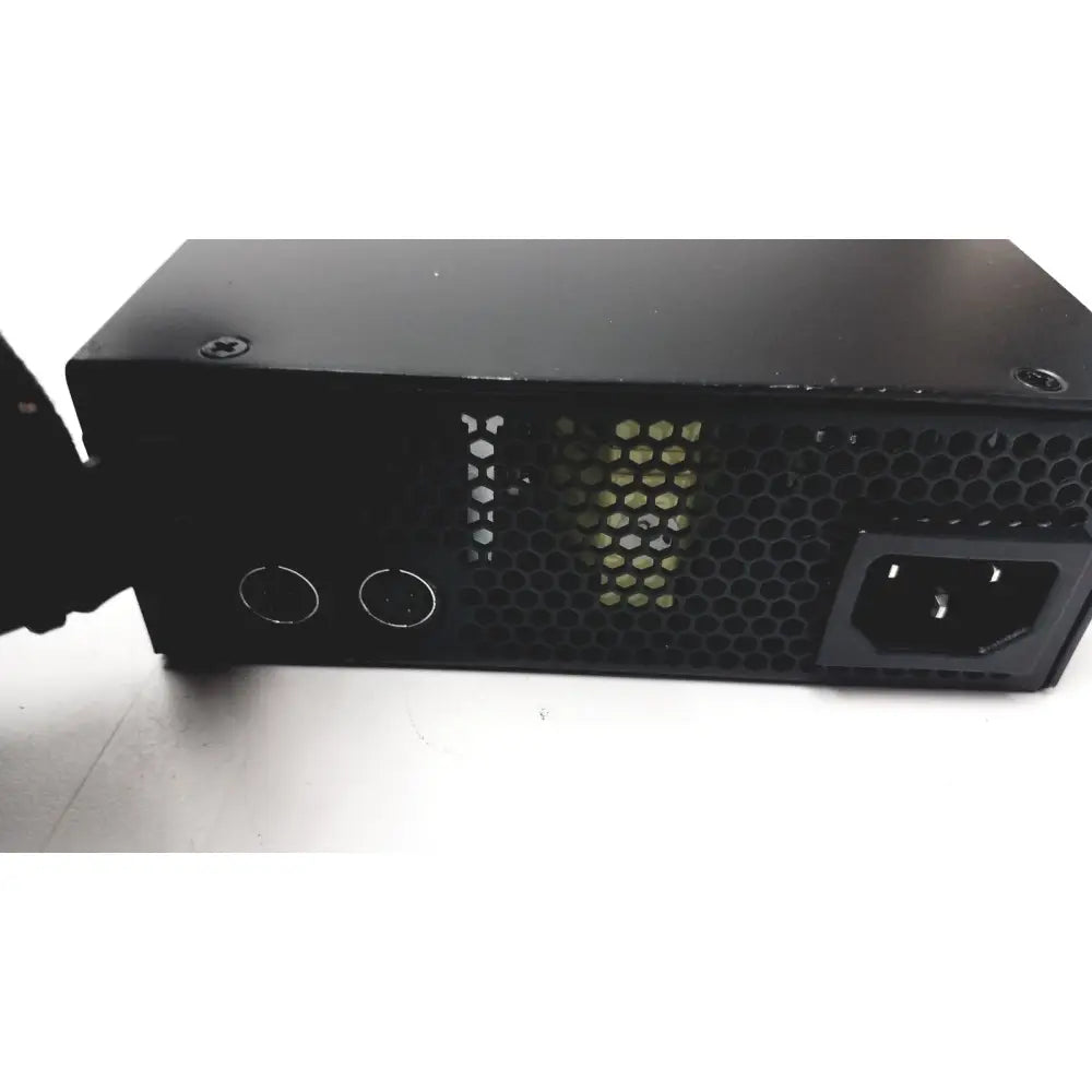 Black rectangular power supply unit with honeycomb grille and circular output ports on the back of american telecare lifeview home video patient monitor