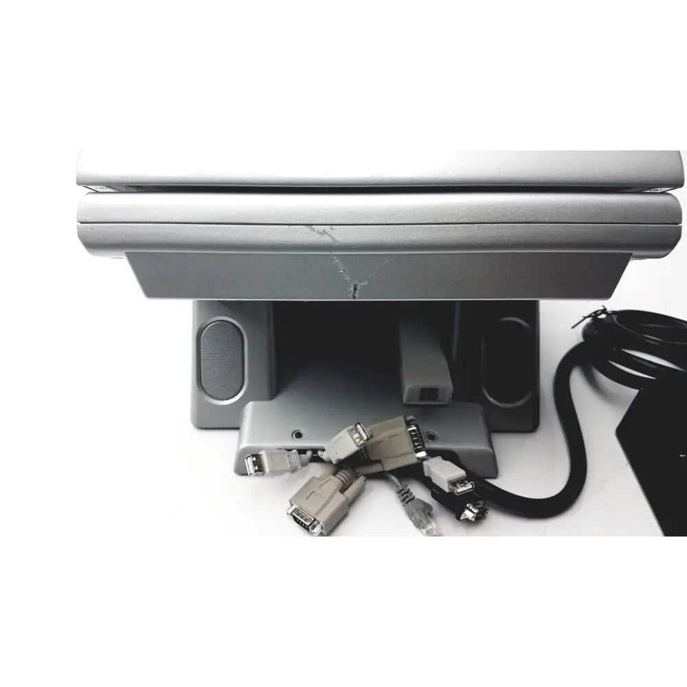 Silver american telecare lifeview laptop stand with integrated speaker grilles and multiple port adapters for home video patient monitor