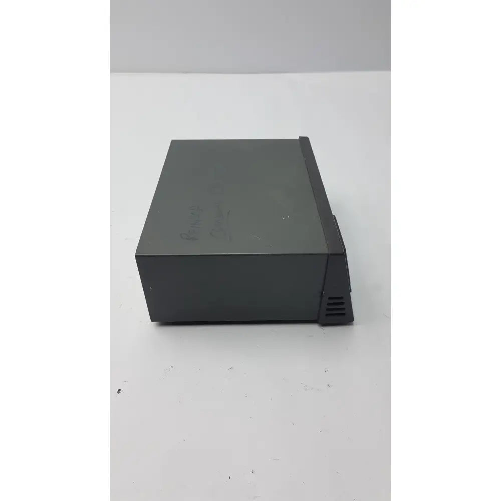 Black plastic external hard drive with matte finish and ventilation slits for amersham pharmaciia biotech power supply EPS 301