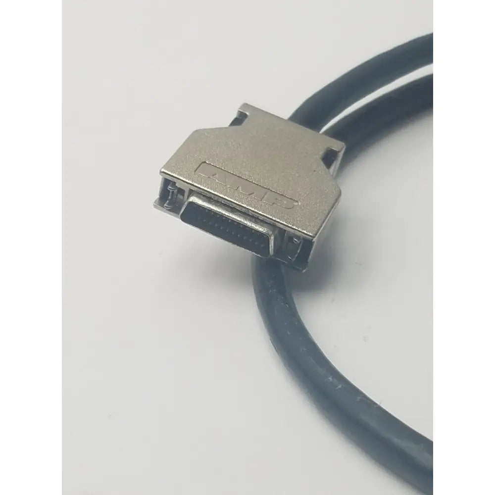 Silver-colored amp scsi cable with black cable featuring 26-pin vhcdi to 26-pin male connector