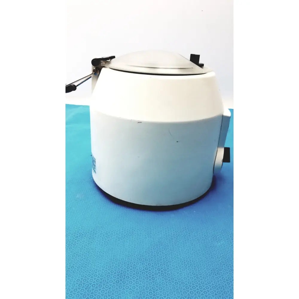 White ample scientific champion centrifuge with rounded body black lid latch and side handle model e33-12 3300 rpm timer