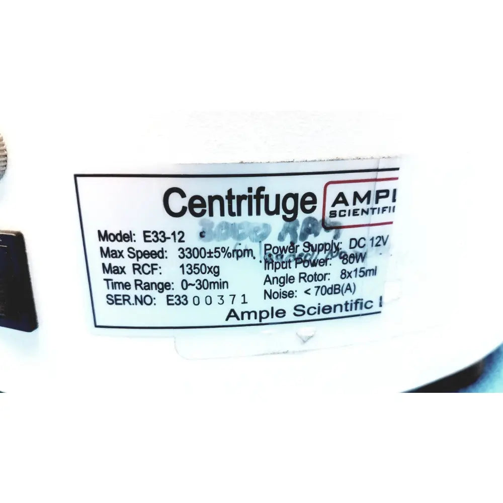 White ample scientific champion e33-12 centrifuge with black label showing technical specifications and 0-30 min timer