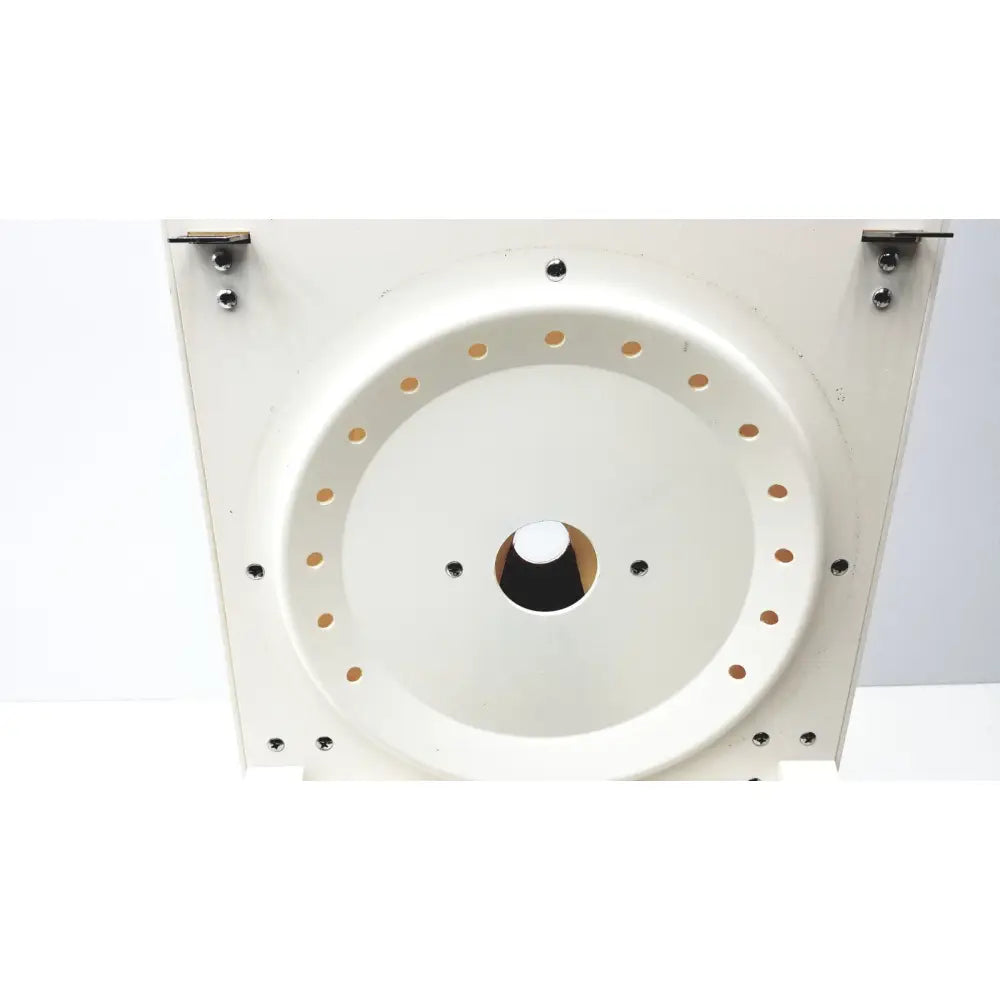 White circular metal mounting plate with evenly spaced holes for ample scientific champion f-33d digital laboratory centrifuge