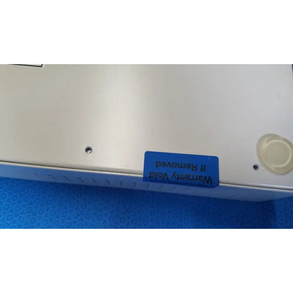 White plastic ampronix scanmaxx ds2165mp medical video converter with warranty void if removed sticker on back side