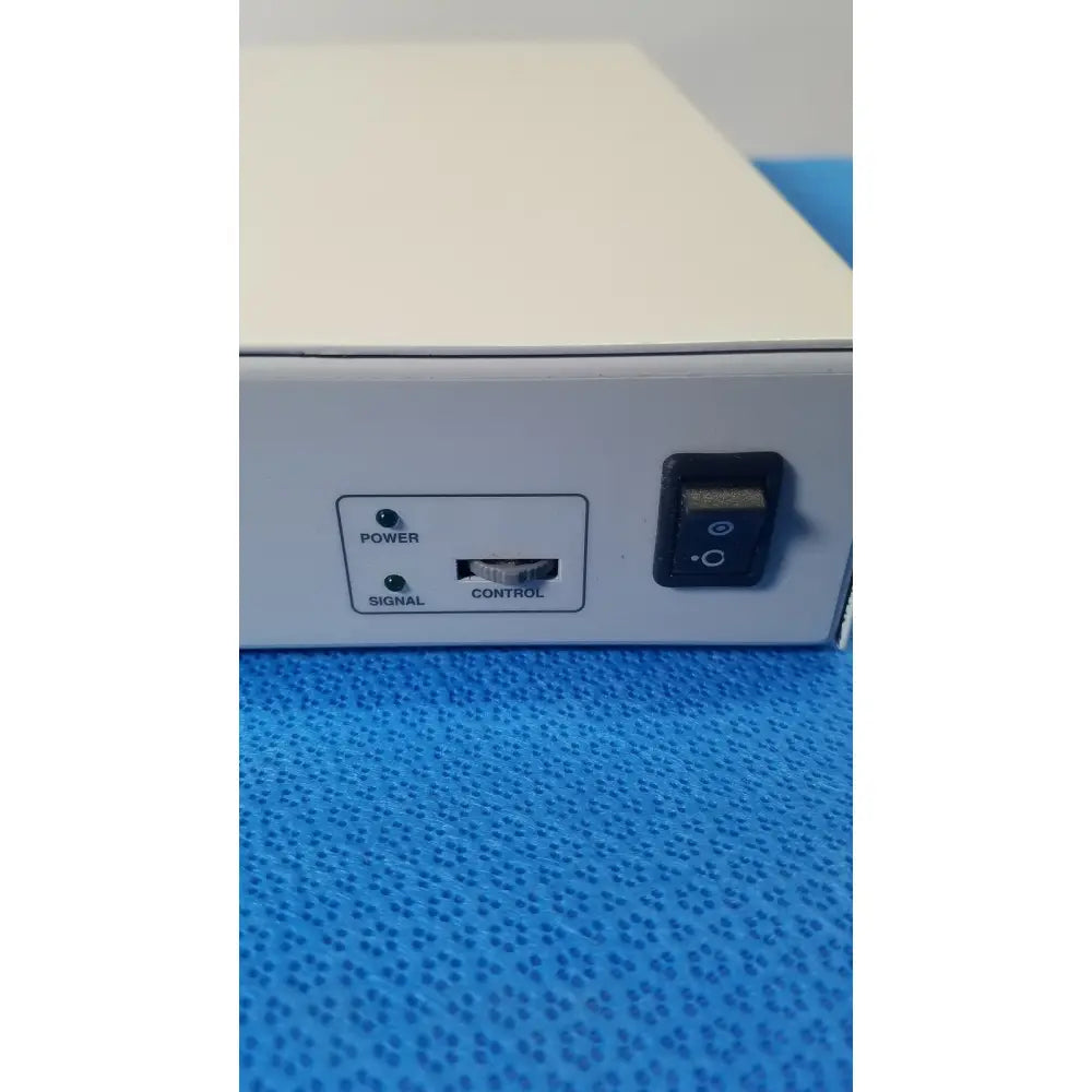 White rectangular ampronix scanmaxx ds2165mp medical video converter with power switch signal light and control dial on side panel