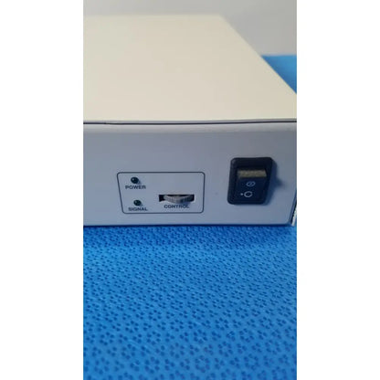White rectangular ampronix scanmaxx ds2165mp medical video converter with power switch signal light and control dial on side panel