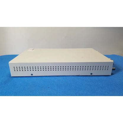 White rectangular ampronix scanmaxx ds2165mp medical video converter with perforated front panel and side metallic connectors