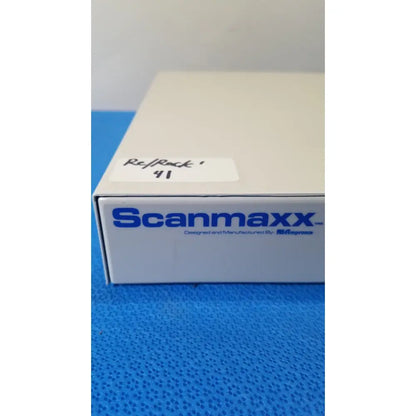 White scanmaxx ds2165mp medical video converter box with blue branding and handwritten label by ampronix