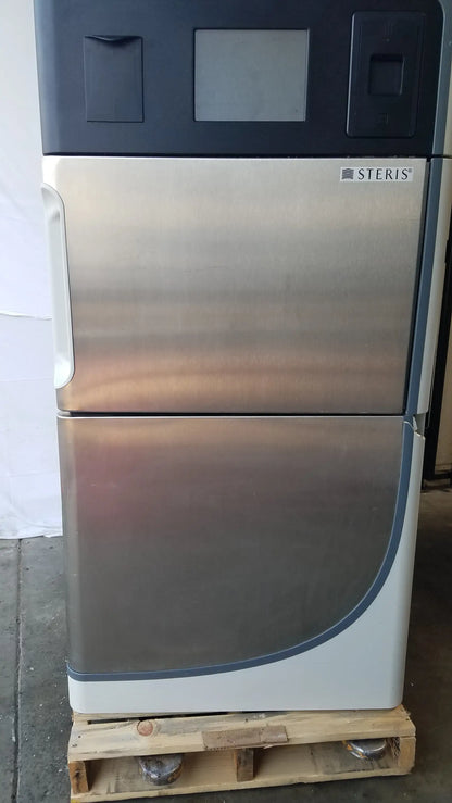 Amsco steris v-pro max low temperature sterilization system stainless steel unit with dark gray top and curved lower section