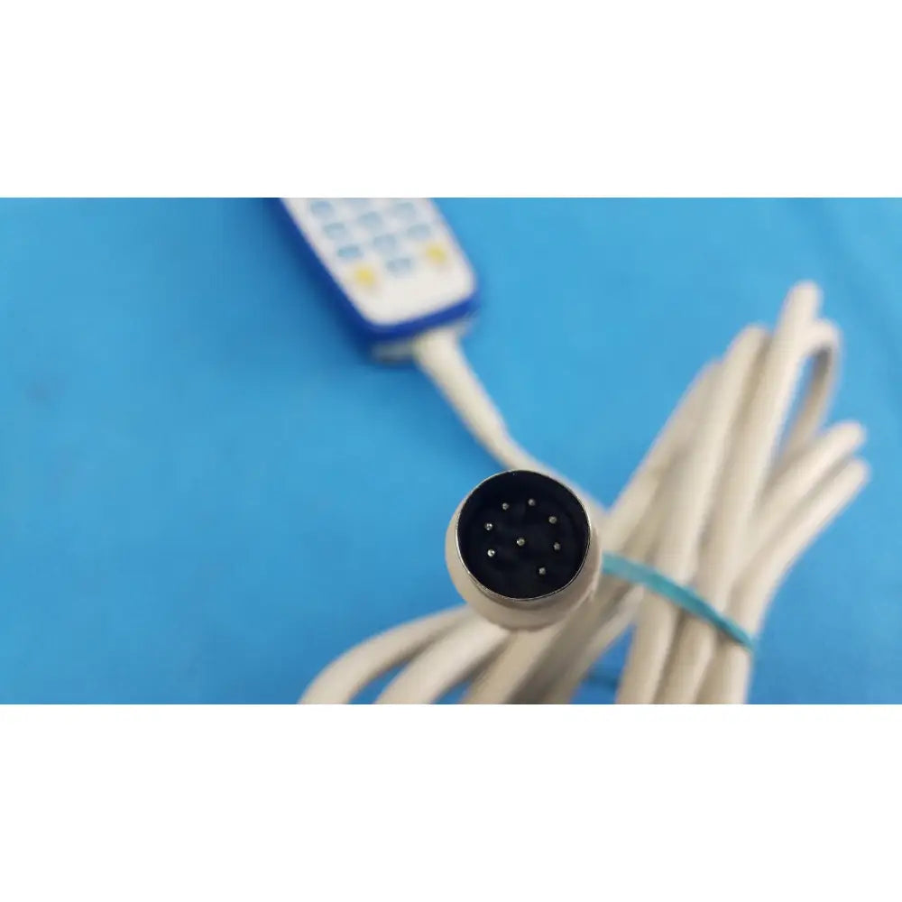White medical cable with black 9-pin connector and blue remote control of anacom medtek a1501-088dj remote handset
