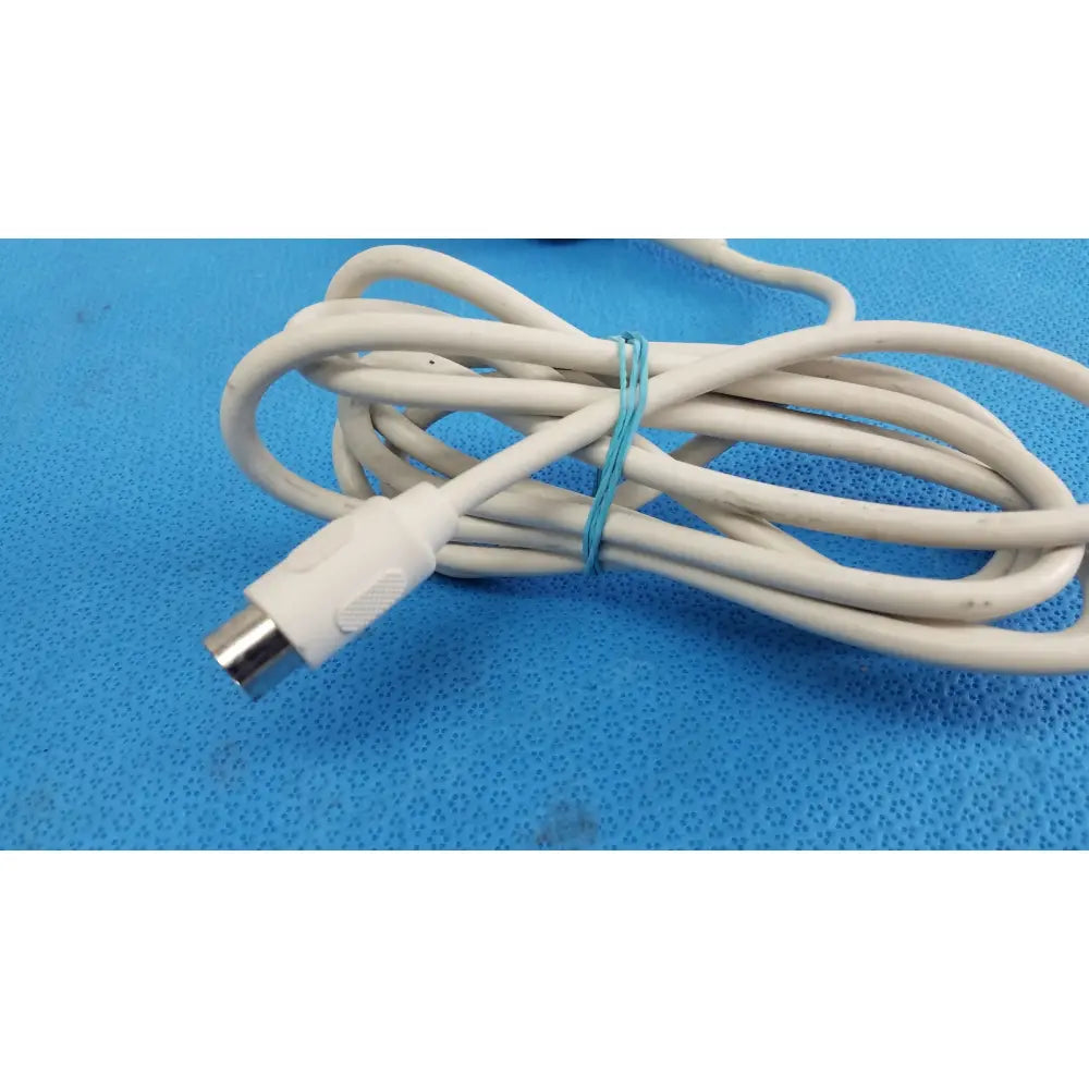 White coiled cable with metallic connector and light blue tie for anacom medtek a1501-088dj remote handset controller
