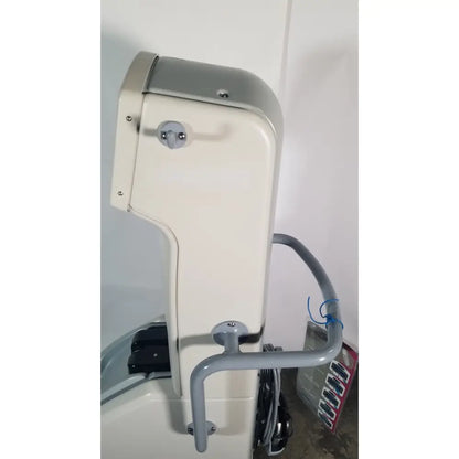 Beige and gray industrial-grade angiojet ultra thrombectomy system console with curved handle and metallic accents