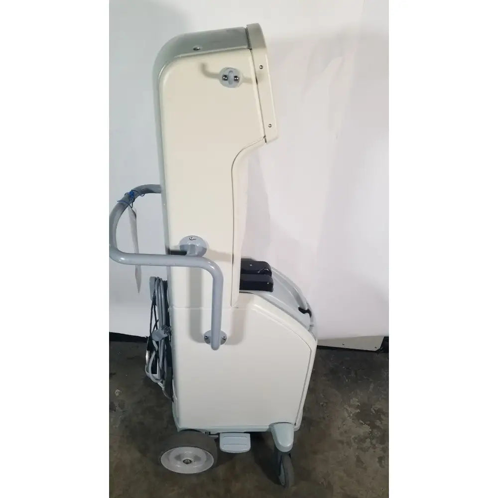 Cream-colored angiojet ultra thrombectomy system console with gray metal frame and wheels for advanced clot removal