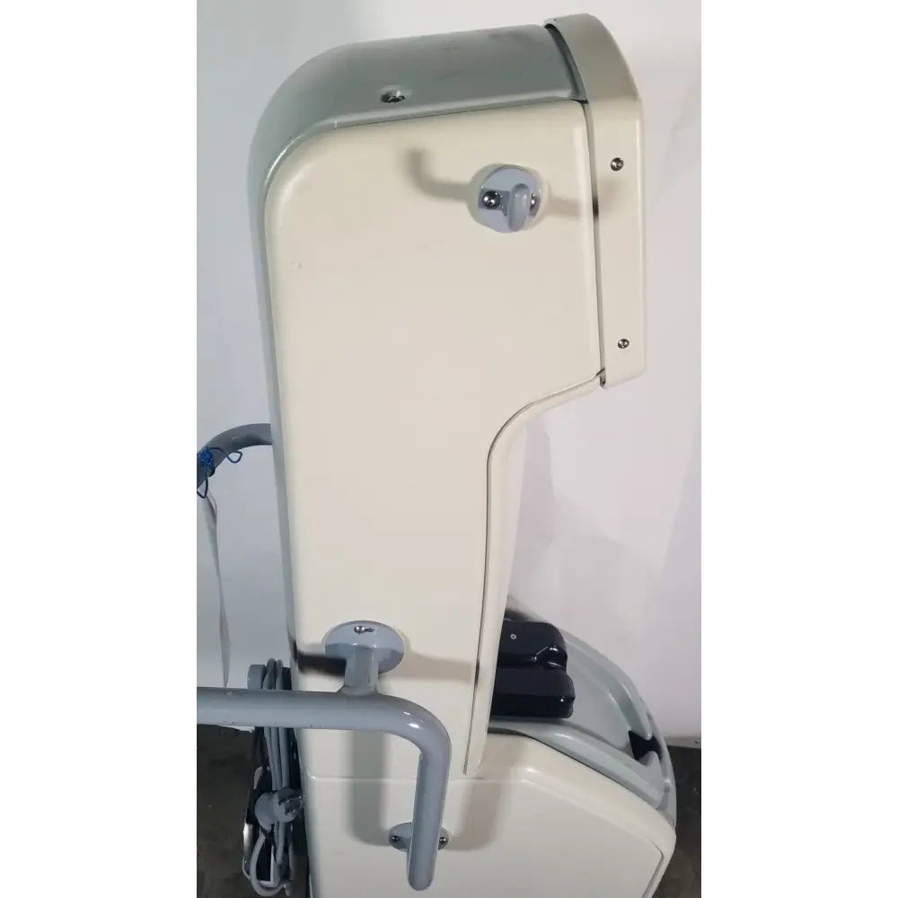 Cream-colored metal-framed medical examination chair with gray accents and curved backrest for angiojet ultra thrombectomy system console 5000a