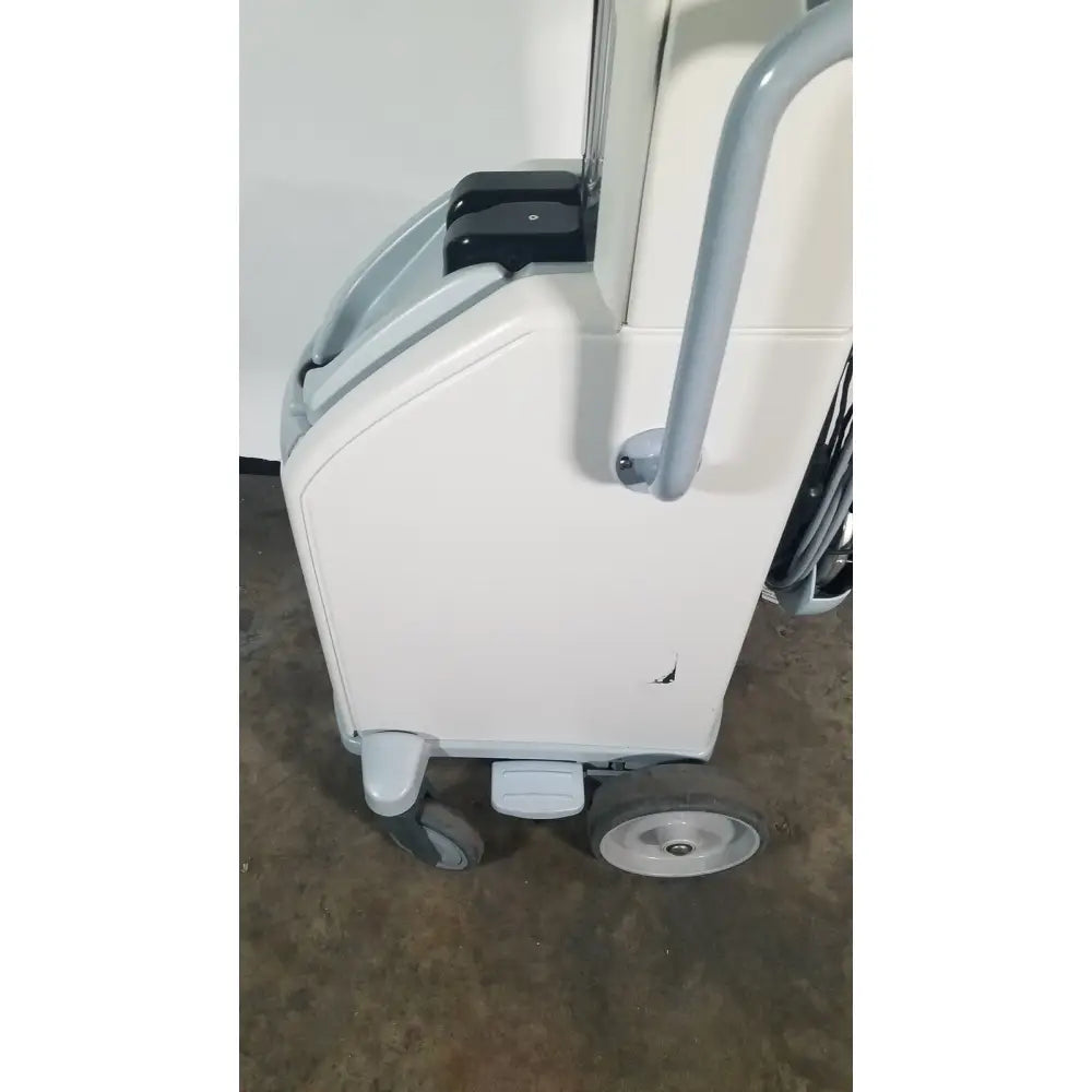 White and gray AngioJet Ultra thrombectomy medical cart with handle, wheels, and black accents for reuse medical settings