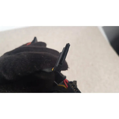 Black plastic sata power connector with red and yellow wires attached to antec truepower 550w black switching power supply