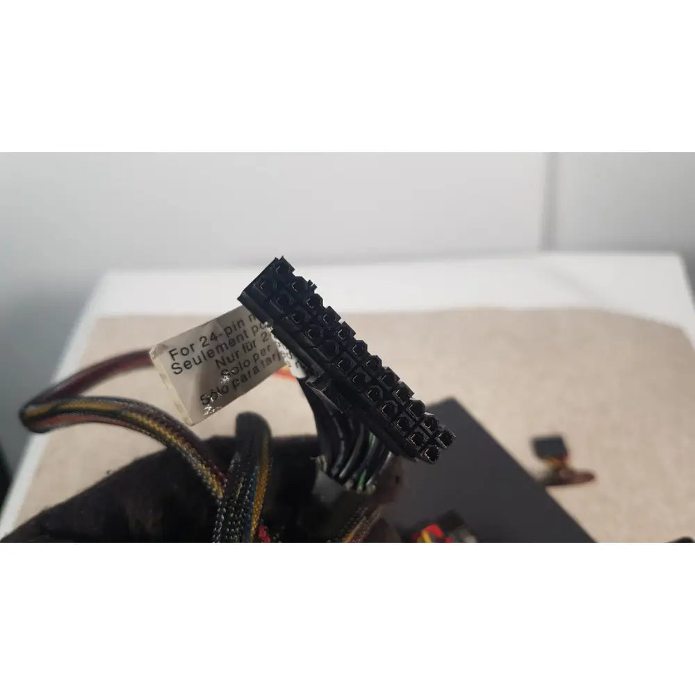 Black 24-pin power connector with label for 24-pin motherboards on antec truepower 550w black switching power supply