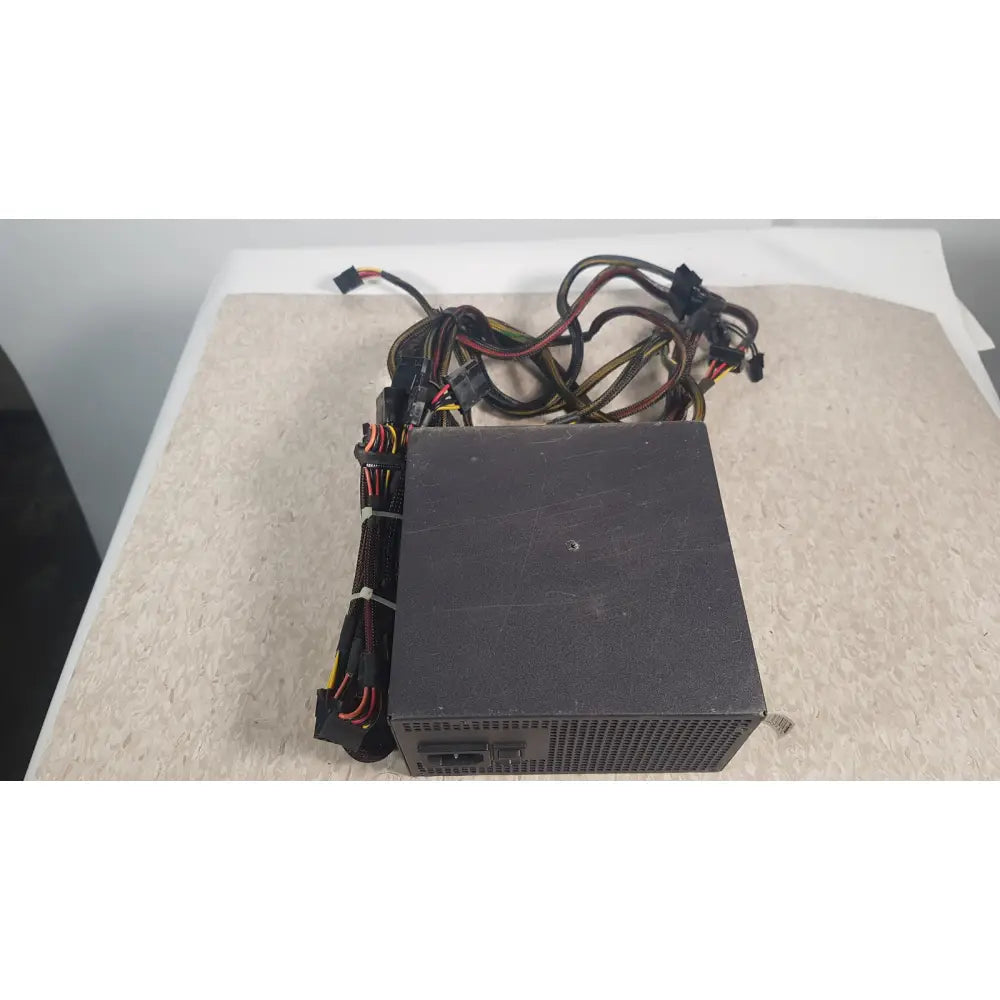 Black rectangular antec truepower 550w switching power supply with bundled cables and connectors for desktop use