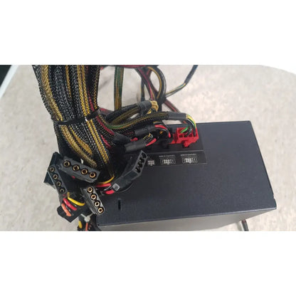 Antec TruePower 550W black switching power supply unit with colorful braided cables and red connectors