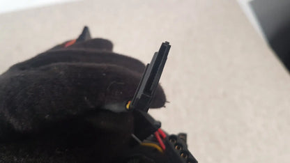 Black plastic sata power connector with red and yellow wires attached to antec truepower 550w black switching power supply