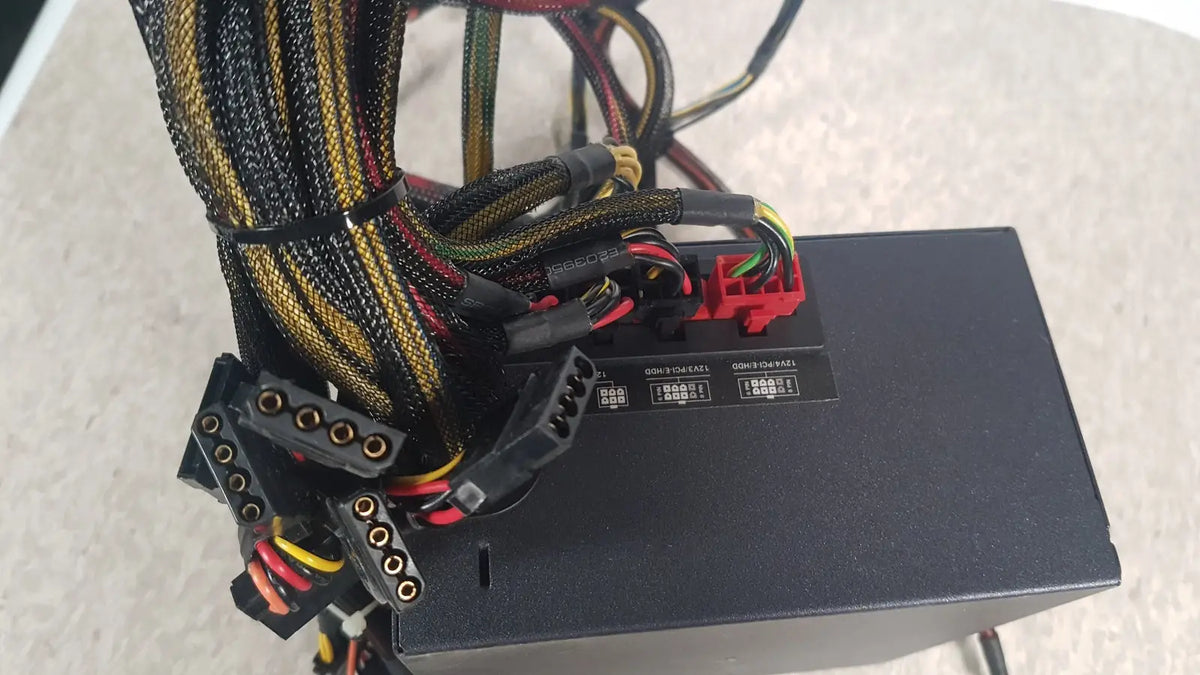 Antec TruePower 550W black switching power supply unit with colorful braided cables and red connectors