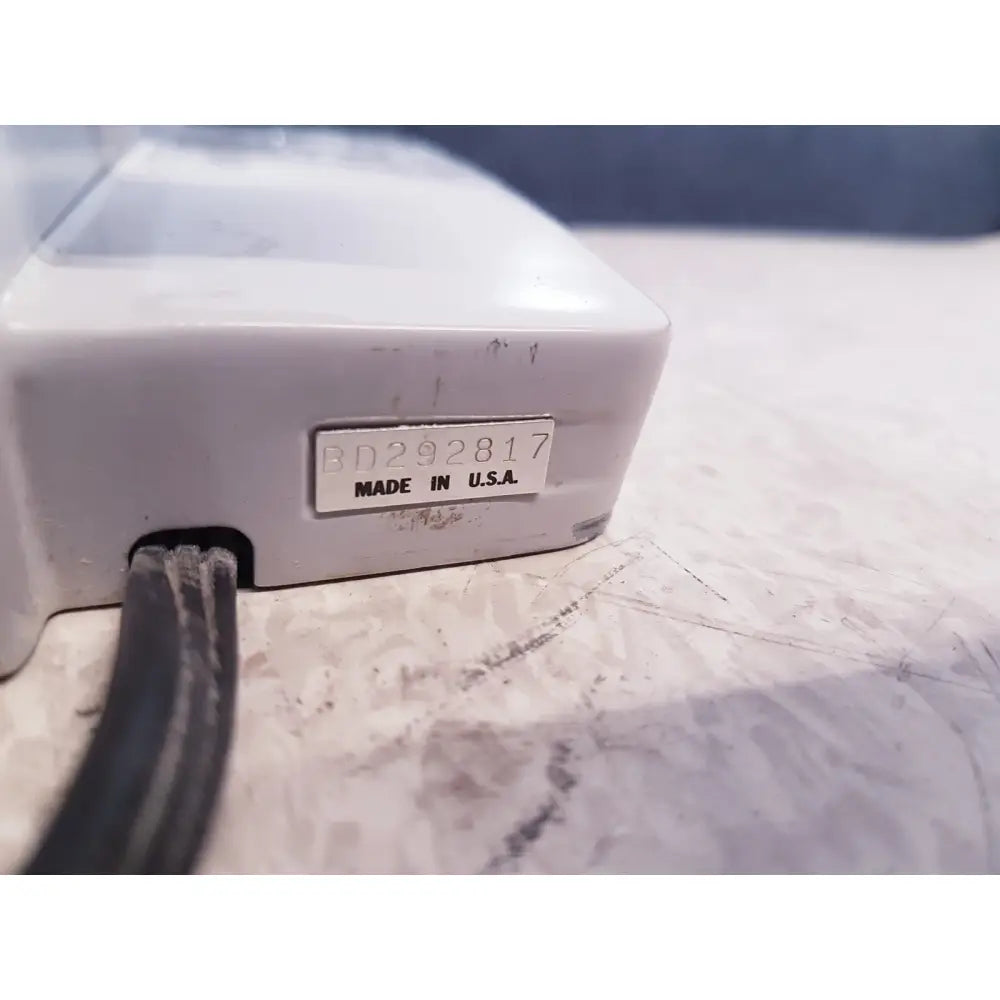 White plastic power strip with silver label bd292817 made in usa and black cord for ao scientific instruments one-ten illuminator model