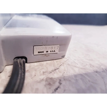 White plastic power strip with silver label bd292817 made in usa and black cord for ao scientific instruments one-ten illuminator model