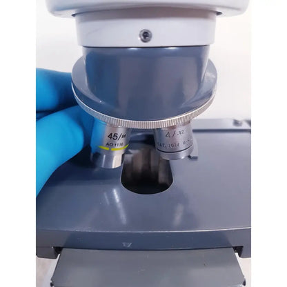 Gray microscope with silver objective lenses 45/60 and 4/.12 from ao scientific instruments one-ten illuminator model 1130a