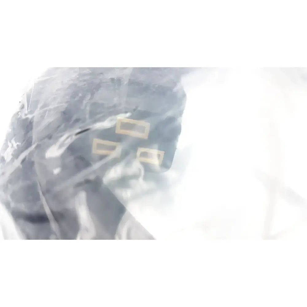 Black tactical helmet with three gold-colored attachments shown alongside schneider electric ap8753 power cord locking c19 to l6-20p 3.0m