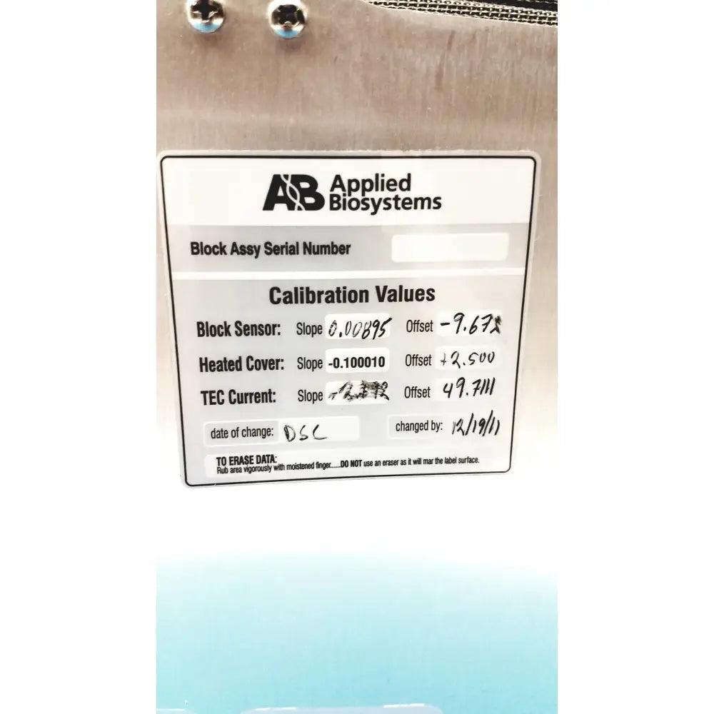 White label with black text and logo from applied biosystems showing calibration values on high performance laboratory thermal cycler